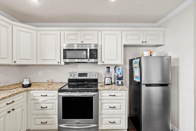 227 Waters Way, Martinez, GA 30907 - kitchen featuring stainless steel appliances, ornamental molding, light stone counters, and white cabinets
