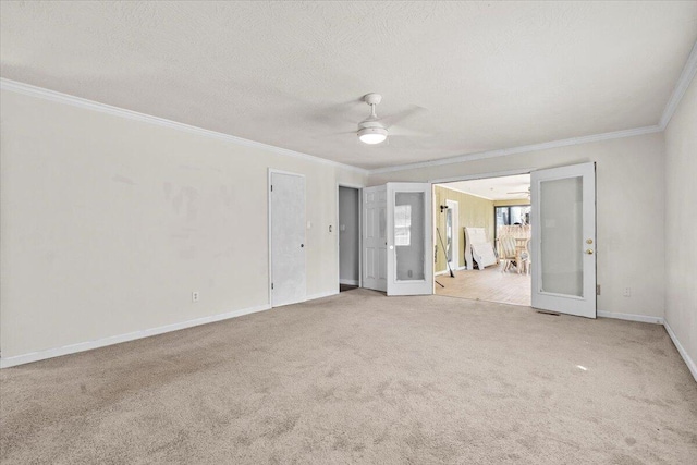 227 Waters Way, Martinez, GA 30907 - spare room with crown molding, carpet flooring, a ceiling fan, baseboards, and french doors