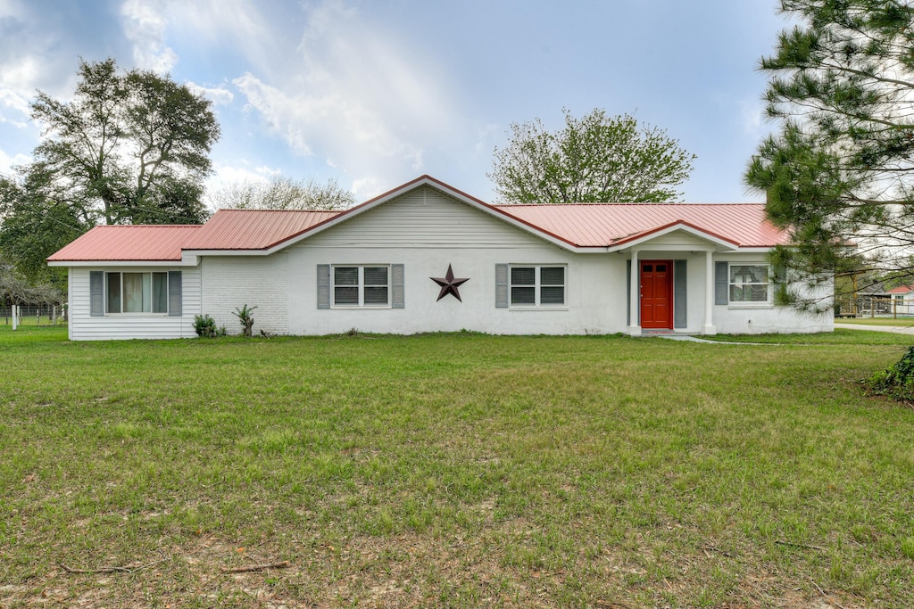4735 Storey Mill Rd, Hephzibah, GA 30815 - single story home with metal roof and a front yard