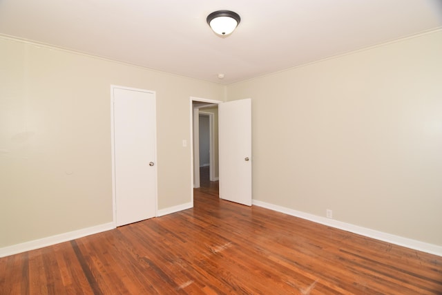 spare room featuring hardwood / wood-style floors