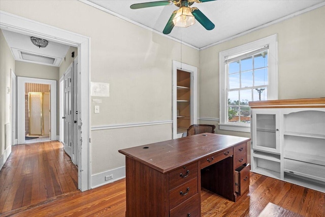 office featuring ceiling fan, ornamental molding, and hardwood / wood-style flooring