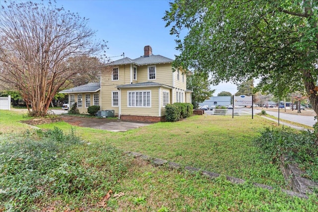 exterior space featuring a front yard