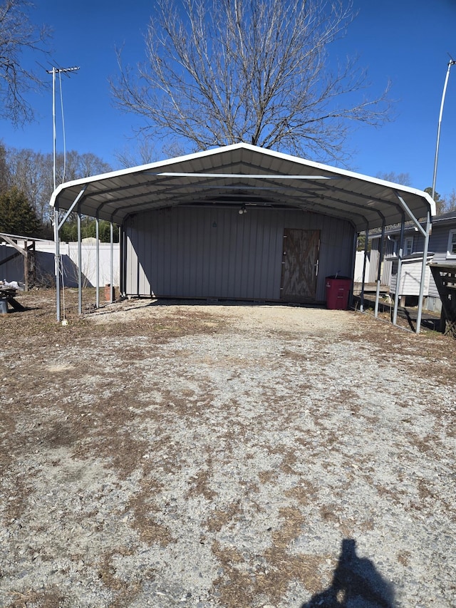 exterior space with a carport