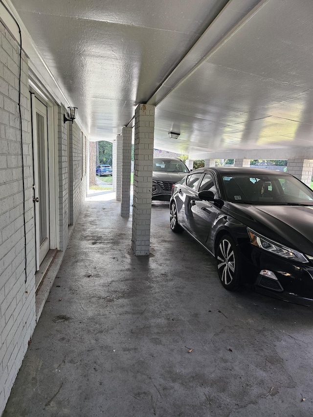 garage with a carport