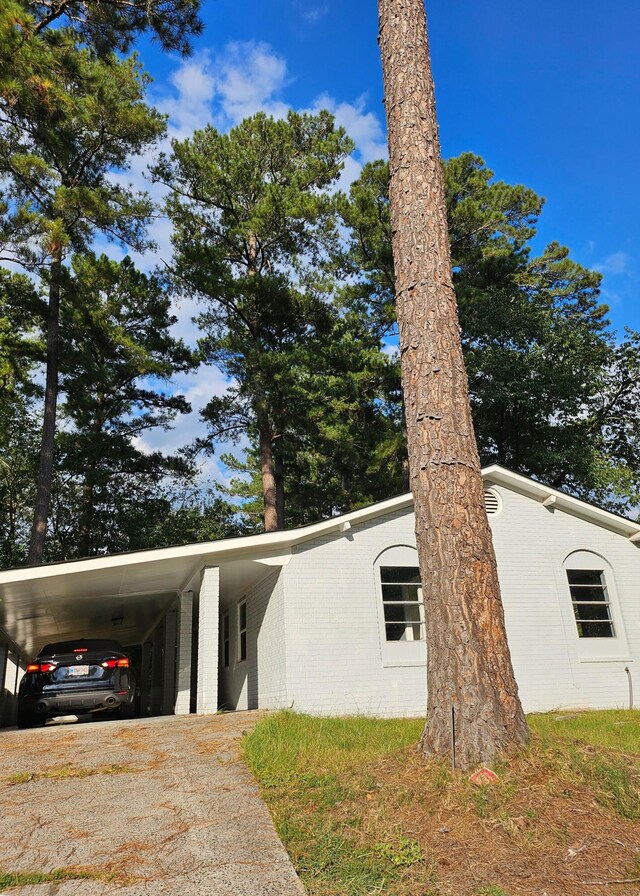 view of front of house with a carport