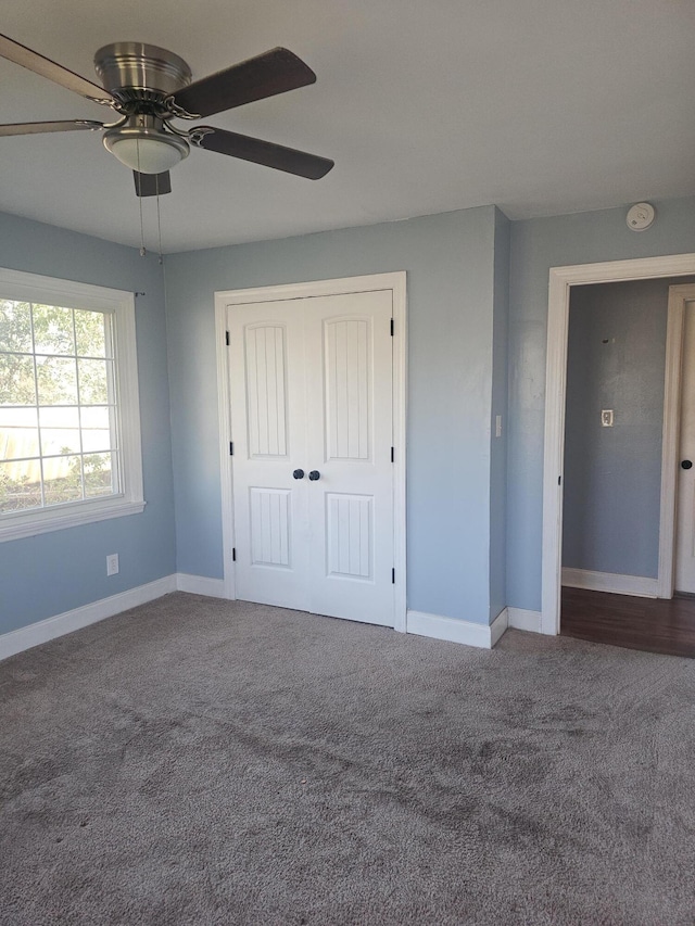 4596 Hickory Dr, Evans, GA 30809 - unfurnished bedroom featuring ceiling fan, baseboards, and carpet floors