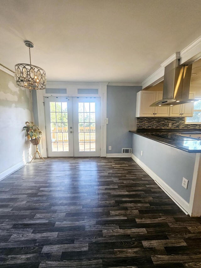 4596 Hickory Dr, Evans, GA 30809 - interior space featuring baseboards, visible vents, dark wood-type flooring, french doors, and crown molding