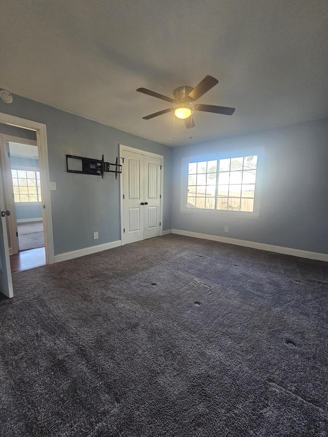 4596 Hickory Dr, Evans, GA 30809 - carpeted spare room featuring a wealth of natural light, baseboards, and a ceiling fan