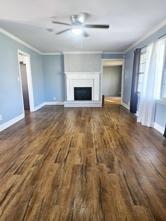 4596 Hickory Dr, Evans, GA 30809 - unfurnished living room featuring baseboards, a fireplace, dark wood-style flooring, and ceiling fan