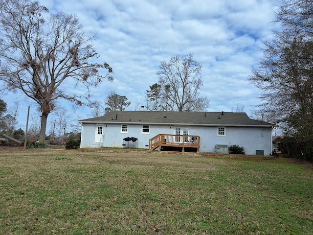 4596 Hickory Dr, Evans, GA 30809 - back of property with a deck, a yard, and stucco siding