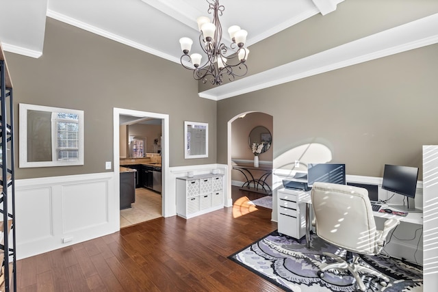 office area featuring crown molding, dark wood-type flooring, a notable chandelier, and beam ceiling