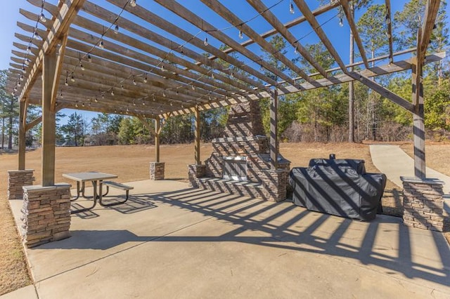 view of property's community featuring a patio and a pergola