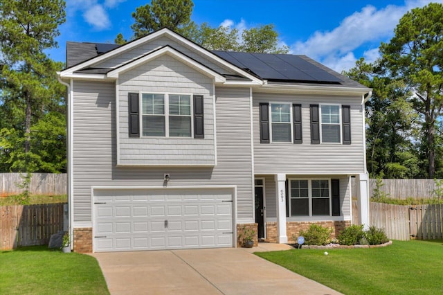 6093 Whitewater Dr, North Augusta, SC 29841 - view of front of property featuring solar panels, concrete driveway, and an attached garage