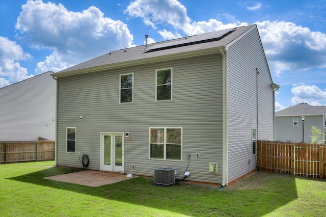 6093 Whitewater Dr, North Augusta, SC 29841 - rear view of house featuring solar panels, central AC unit, and a patio
