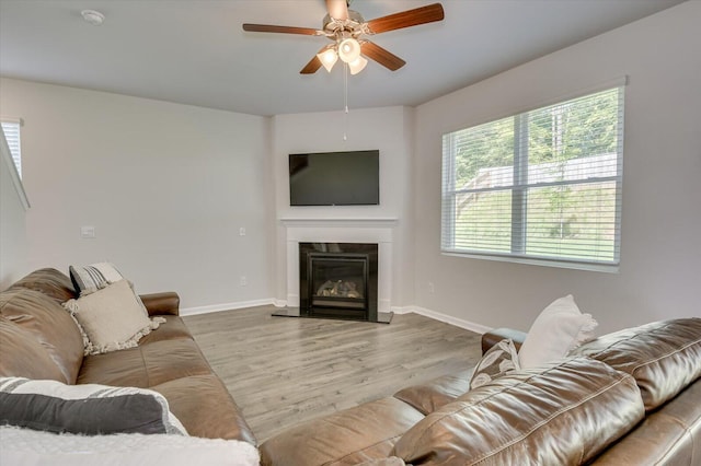 6093 Whitewater Dr, North Augusta, SC 29841 - living room featuring healthy amount of natural light, ceiling fan, baseboards, and wood finished floors