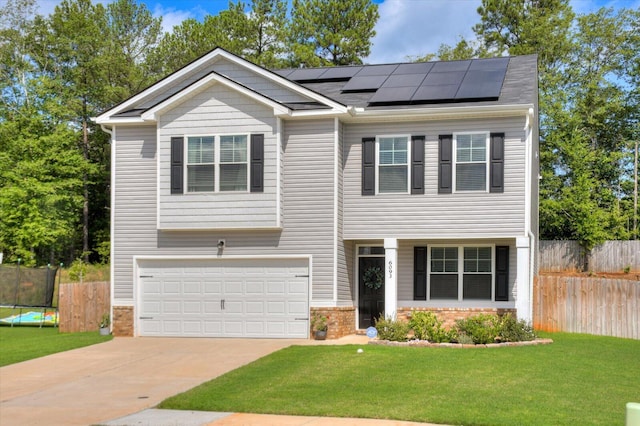 6093 Whitewater Dr, North Augusta, SC 29841 - view of front facade featuring solar panels, an attached garage, concrete driveway, and brick siding