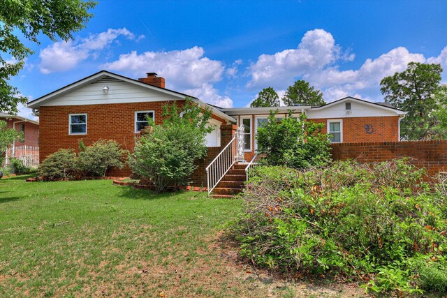3009 Arcadia Ct, Augusta, GA 30906 - rear view of property with brick siding and a chimney