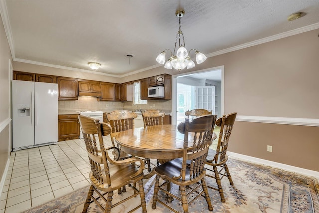 3009 Arcadia Ct, Augusta, GA 30906 - dining area featuring ornamental molding, a chandelier, and light tile patterned flooring