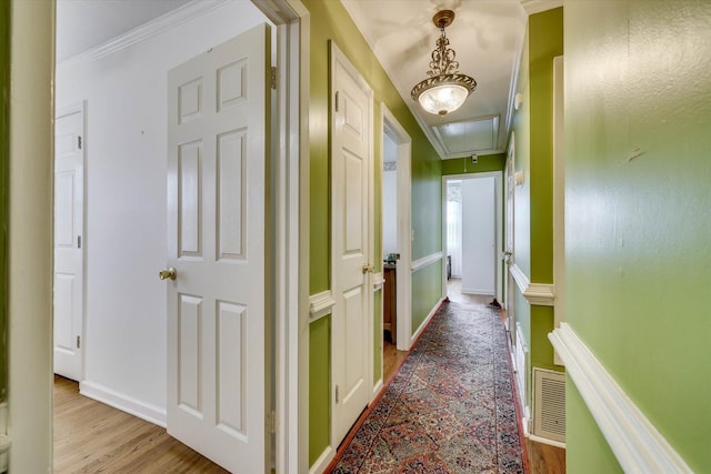 3009 Arcadia Ct, Augusta, GA 30906 - corridor featuring attic access, wood finished floors, ornamental molding, and baseboards