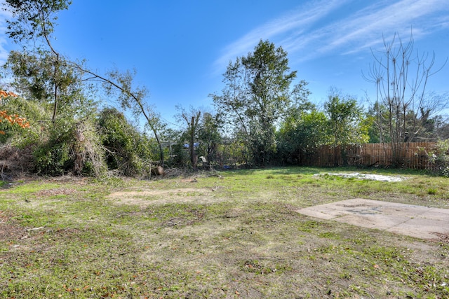 view of yard with fence