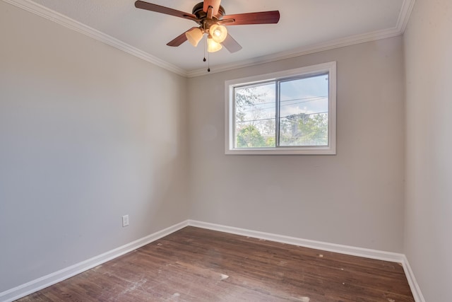 empty room featuring baseboards, a ceiling fan, wood finished floors, and crown molding