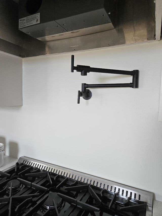 details featuring stovetop with downdraft