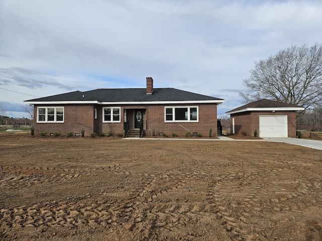 ranch-style home with concrete driveway, brick siding, an outdoor structure, and a chimney