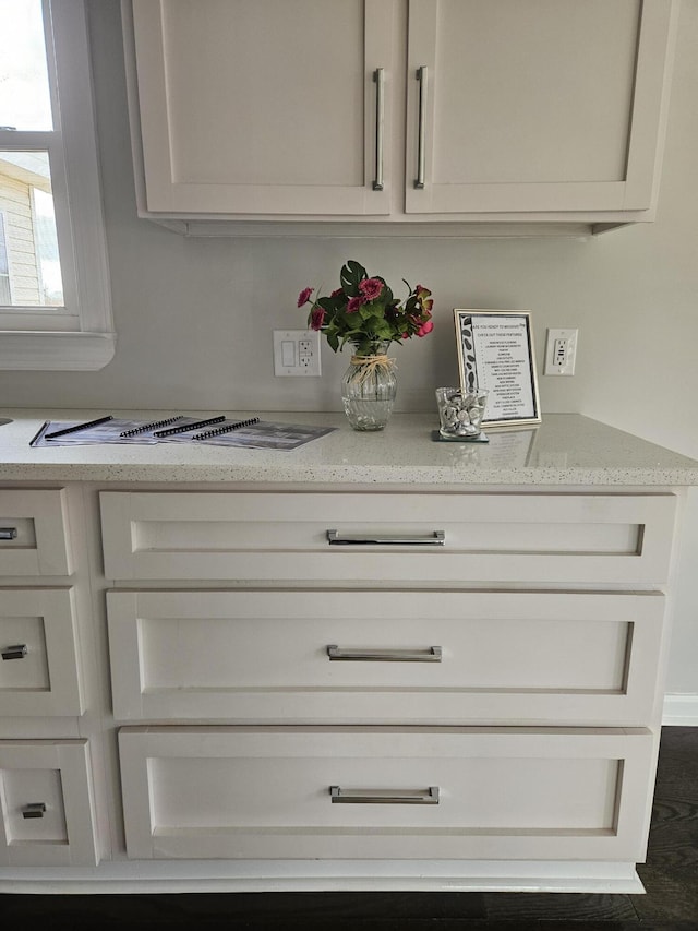 interior space featuring light stone counters