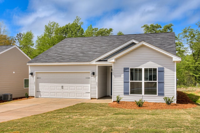 view of front of property with central AC unit, concrete driveway, a garage, and a front yard