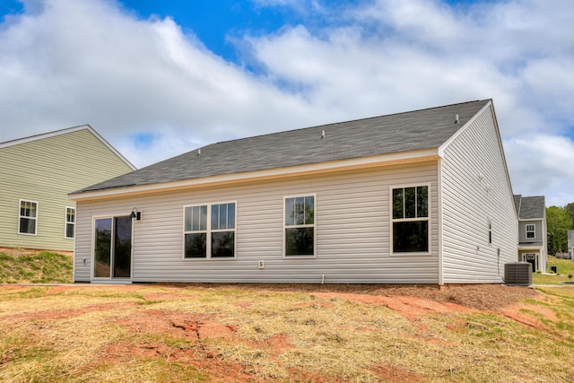 rear view of property with central air condition unit