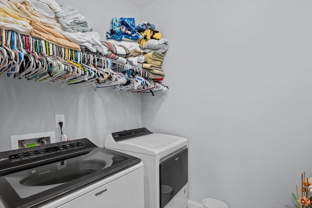 laundry area featuring washing machine and dryer