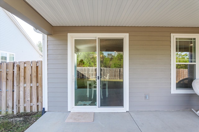 doorway to property with a patio area