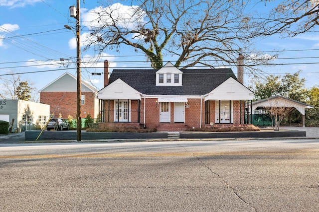 view of front of home featuring a carport