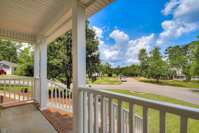 balcony featuring a porch