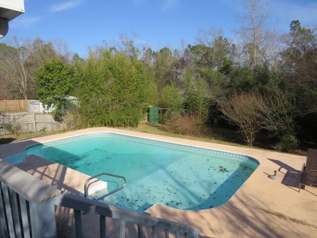 view of pool featuring fence and a fenced in pool