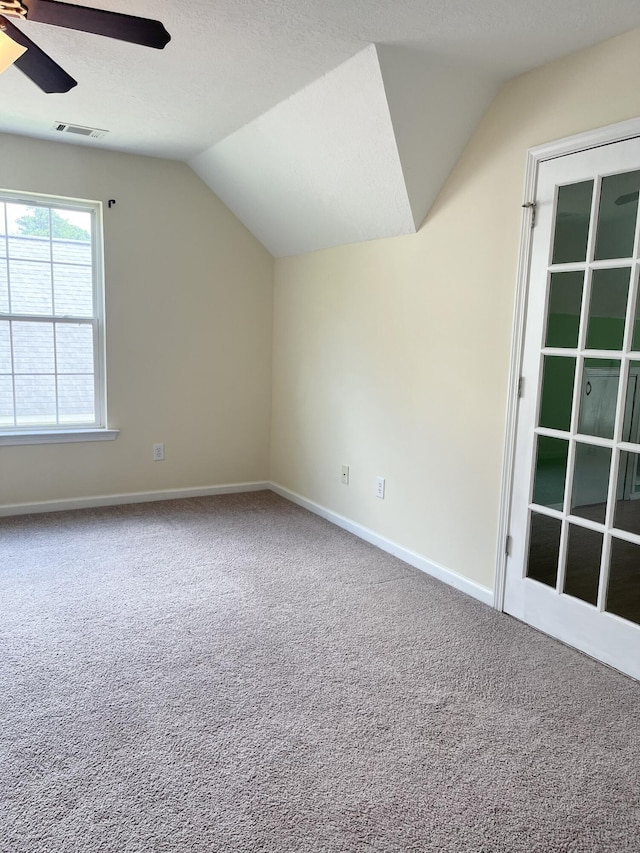 1124 Brighton Dr, Evans, GA 30809 - additional living space featuring lofted ceiling, carpet floors, and a ceiling fan