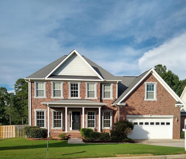 1124 Brighton Dr, Evans, GA 30809 - view of front facade featuring brick siding, an attached garage, driveway, a porch, and a shingled roof