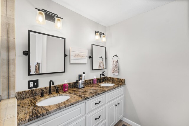 full bathroom with double vanity