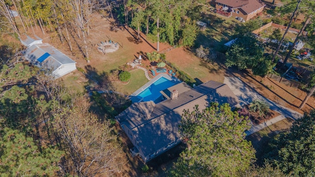 view of subject property featuring a pool