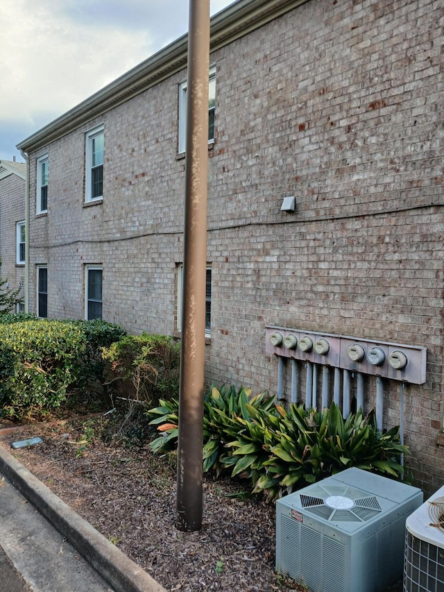 1010 Hickman Rd, Augusta, GA 30904 - view of side of property with a cooling unit and brick siding