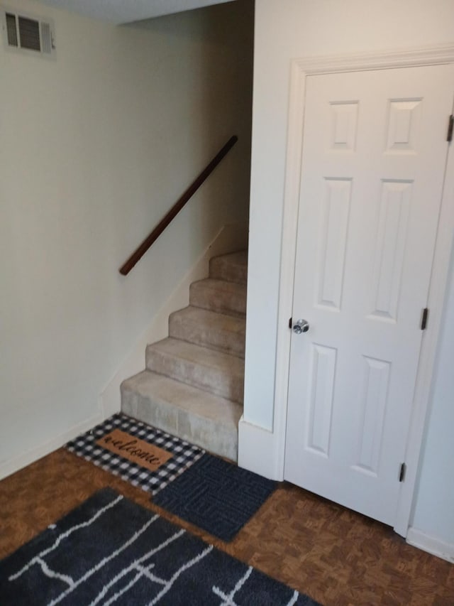 1010 Hickman Rd, Augusta, GA 30904 - staircase with baseboards and parquet flooring