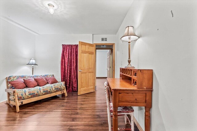 sitting room with dark hardwood / wood-style floors