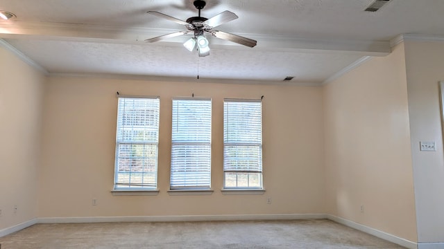 unfurnished room with ceiling fan, visible vents, baseboards, and light colored carpet