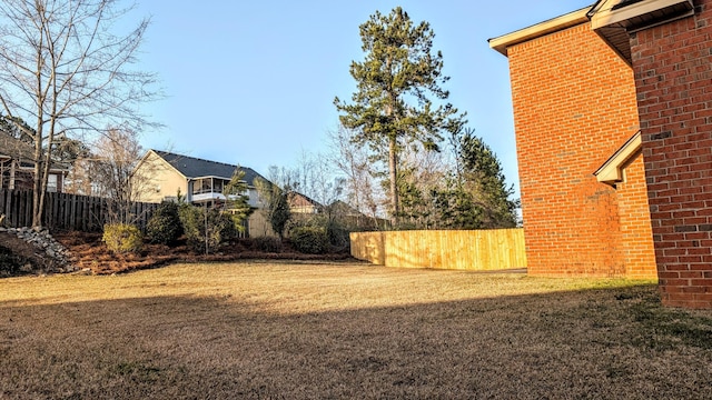 view of yard featuring fence