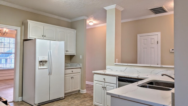 kitchen with white refrigerator with ice dispenser, visible vents, light stone countertops, white cabinetry, and a sink