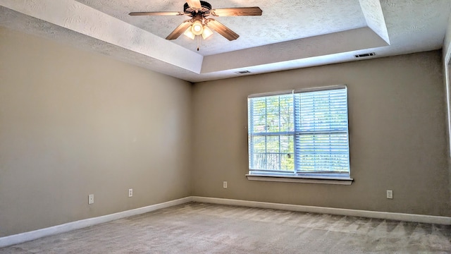 627 Surrey Ln, Martinez, GA 30907 - unfurnished room with a tray ceiling, visible vents, and carpet floors