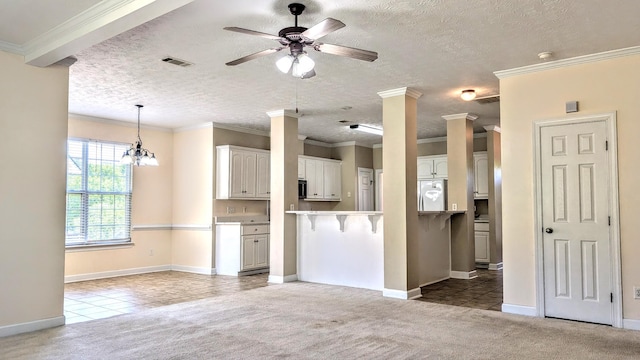 627 Surrey Ln, Martinez, GA 30907 - unfurnished living room featuring ceiling fan with notable chandelier, tile patterned flooring, visible vents, and carpet floors