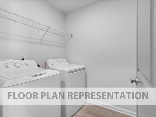 645 Hampton Dr Unit 5B, North Augusta, SC 29860 - washroom featuring washing machine and clothes dryer, baseboards, wood finished floors, and laundry area