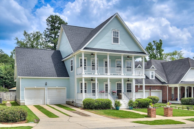 210 Oleander Trl, Evans, GA 30809 - neoclassical / greek revival house with ceiling fan, a porch, an attached garage, concrete driveway, and roof with shingles