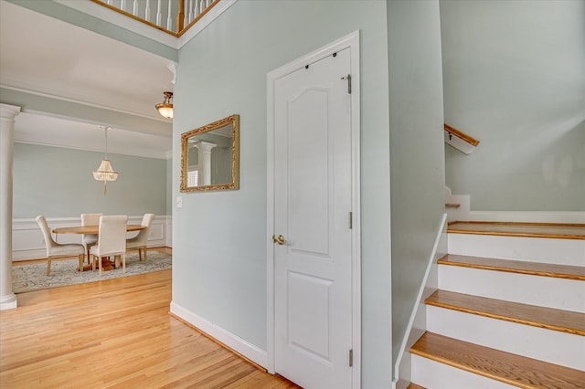 210 Oleander Trl, Evans, GA 30809 - staircase with wood finished floors, ornamental molding, and decorative columns